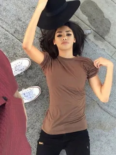 pretty lady lying on the side walk