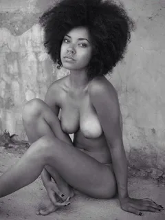 this natural hair black beauty is a cutie pie