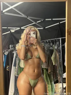 saweetie in a green bikini