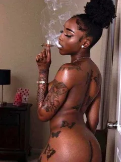 cute black woman smoking a blunt