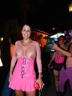 carelessnaked dot com - milf showing her big boobs and posing almost topless in her transparent fishnet dress