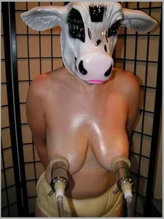 caw mask woman pumped nipples with caw milking machine