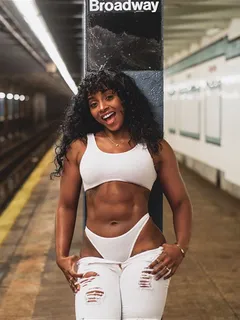 sexy model posing in public subway terminal