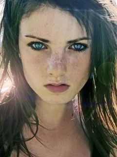 hot brunette with blue eyes